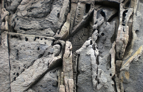 Immagine con roccia, pietra, buchi, astratto, grigio, muro, fori, fessure